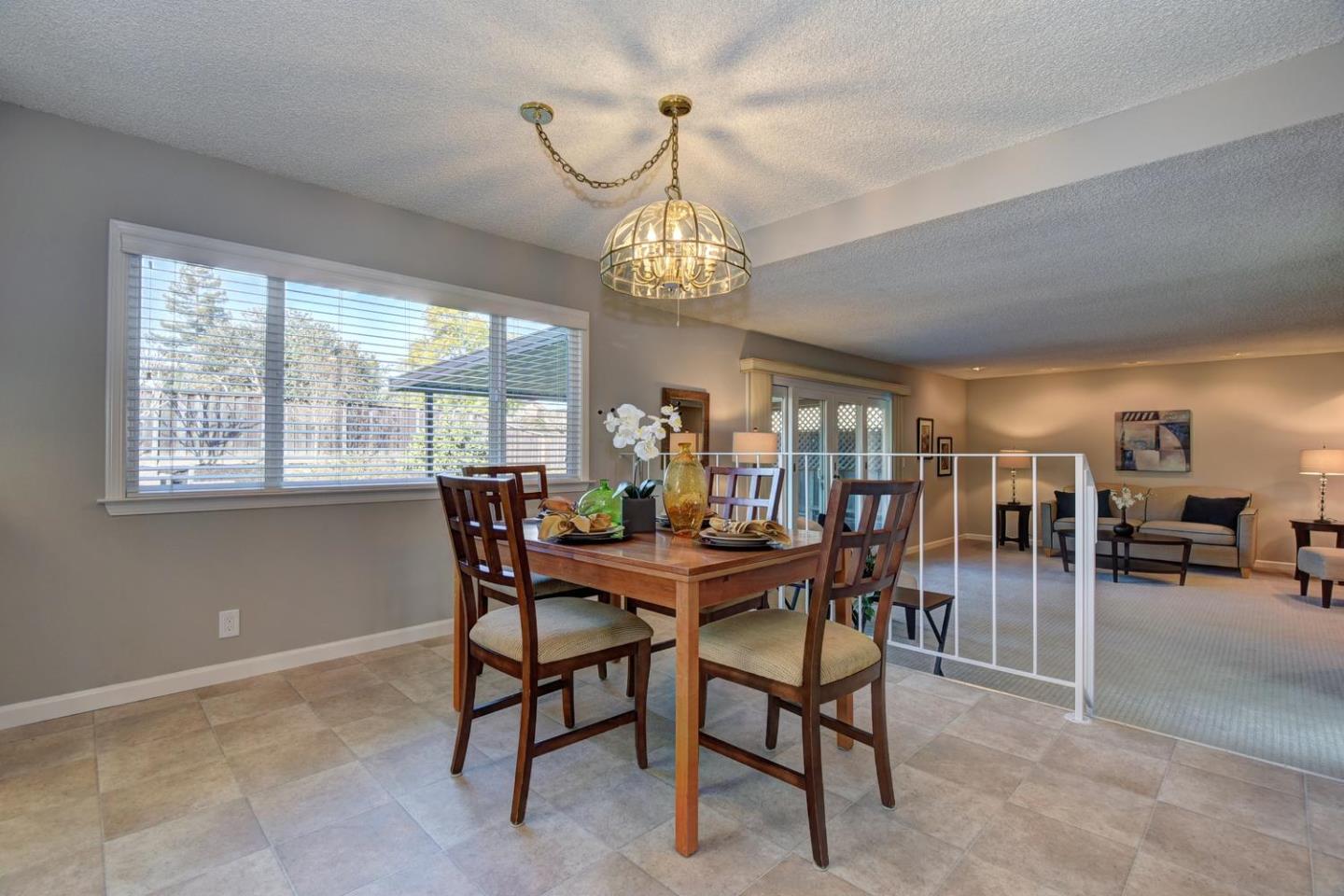 6429 McAbee Road San Jose, CA 95120 - Photo 11 of 28 a view of a dining room with furniture window and outside view