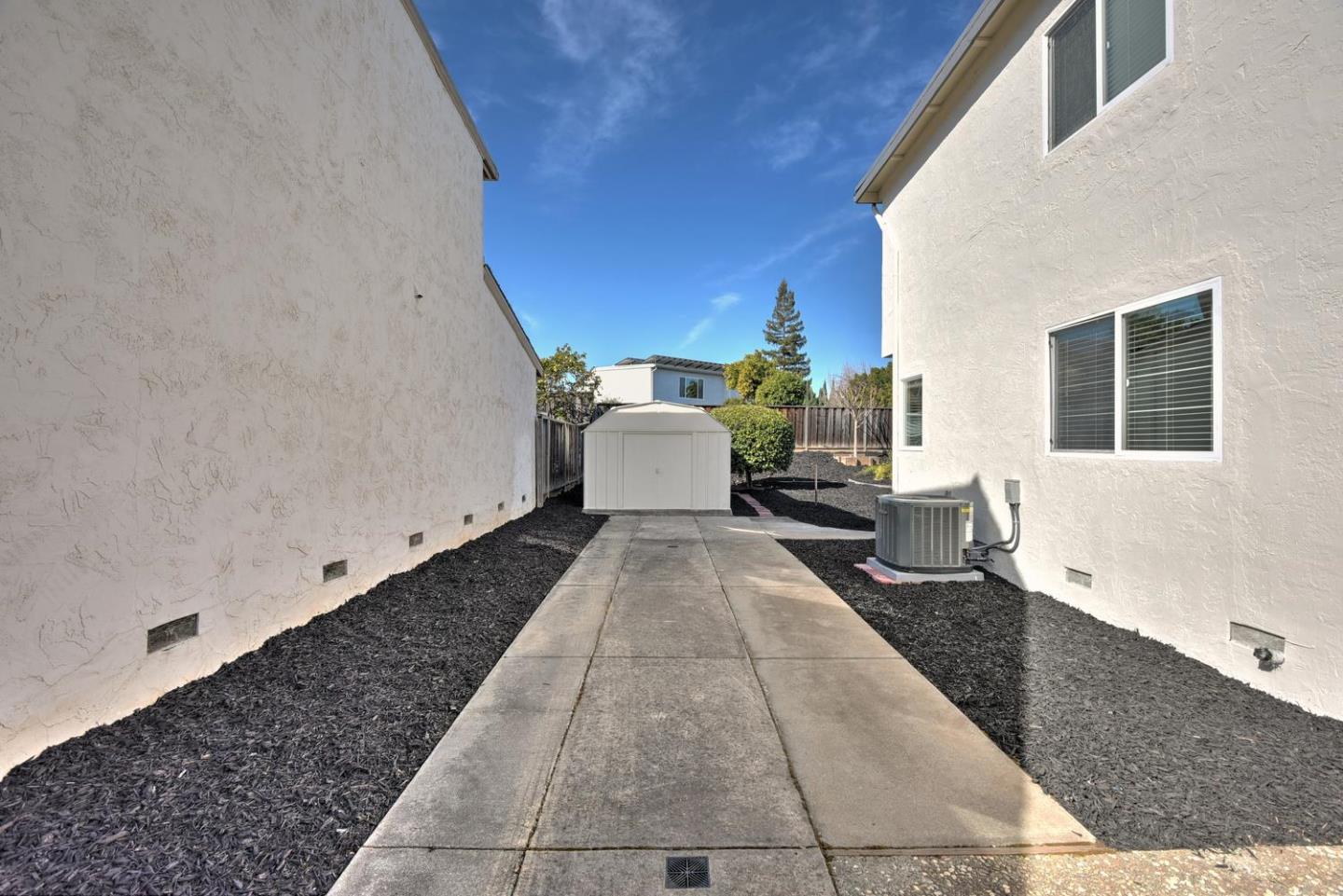 6429 McAbee Road San Jose, CA 95120 - Photo 25 of 28 a front view of a house with a yard