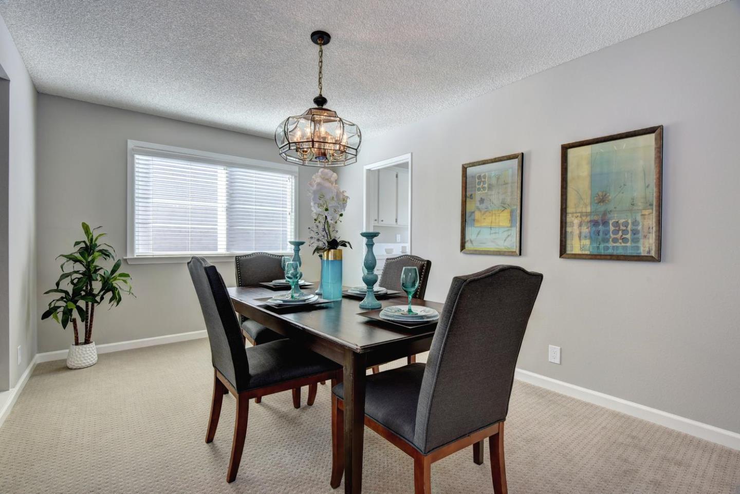 6429 McAbee Road San Jose, CA 95120 - Photo 6 of 28 a view of a dining room with furniture window and wooden floor