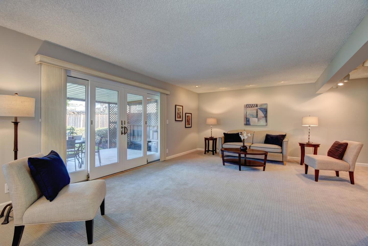 6429 McAbee Road San Jose, CA 95120 - Photo 8 of 28 a living room with furniture and a window