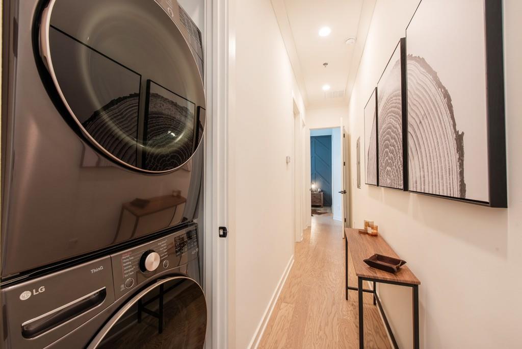 417 East College Avenue, Unit 102 Decatur, GA 30030 - Photo 24 of 60 a view of a hallway with washer and dryer