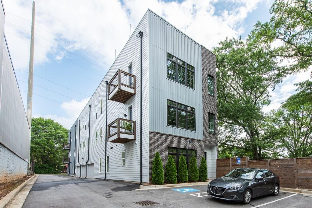 417 East College Avenue, Unit 102 Decatur, GA 30030 - Photo 32 of 60 a car parked in front of a house
