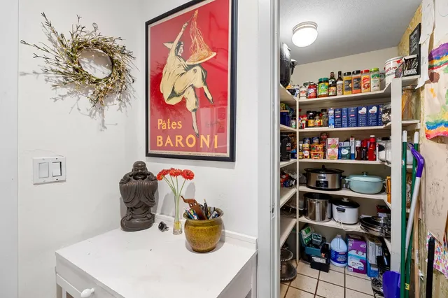 a view of a workspace with furniture and toys