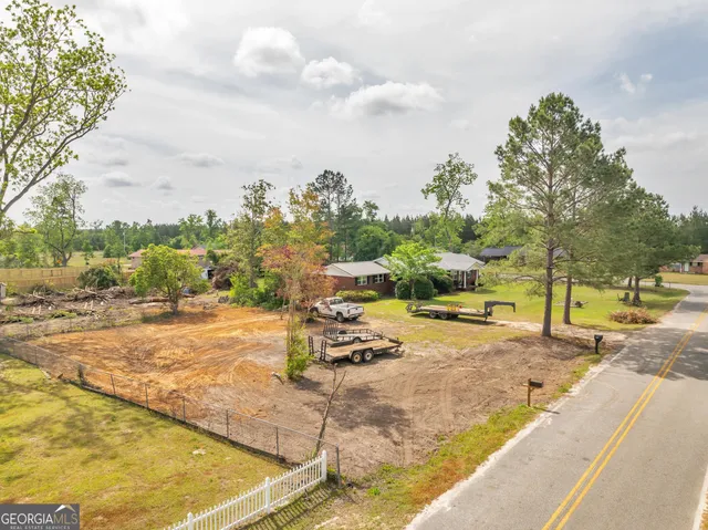 a view of a swimming pool with an outdoor space