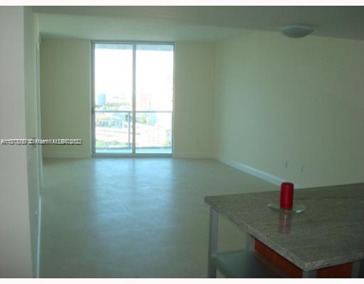 185 Southwest 7th Street, Unit 2207 Miami, FL 33130 - Photo 2 of 8 a room with a window
