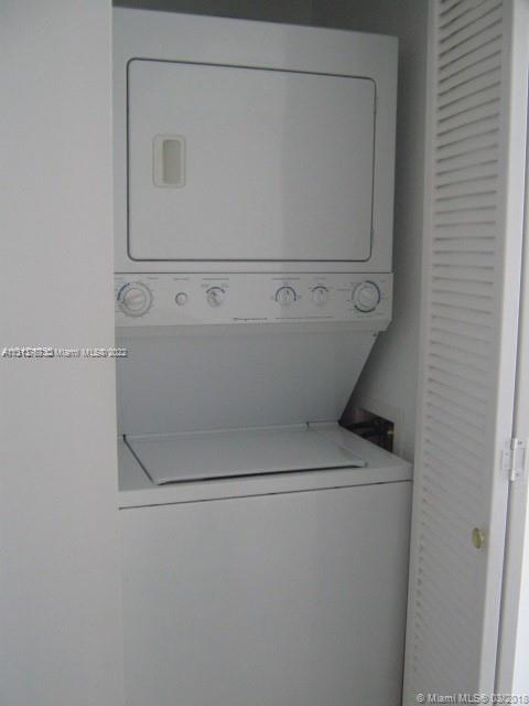 185 Southwest 7th Street, Unit 2207 Miami, FL 33130 - Photo 4 of 8 a close up view of washer and dryer