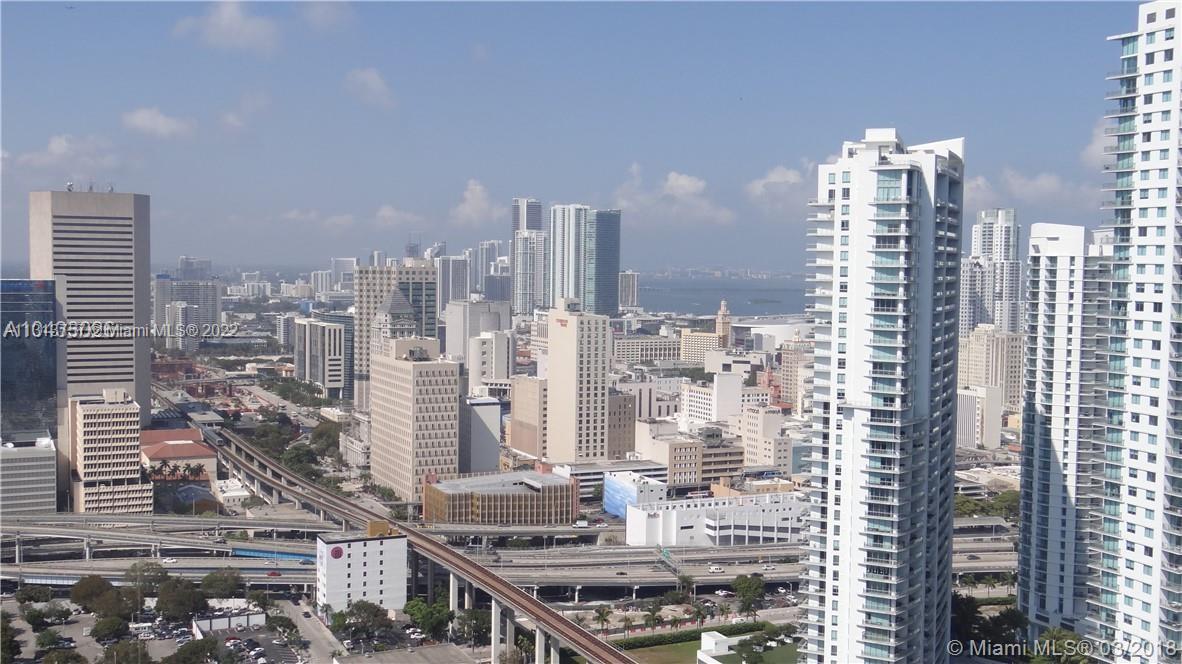 185 Southwest 7th Street, Unit 2207 Miami, FL 33130 - Photo 5 of 8 a view of city with tall buildings