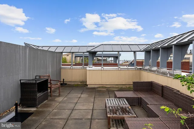 a open kitchen with stainless steel appliances kitchen island granite countertop lots of counter top space