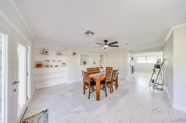 a view of a dining room with furniture