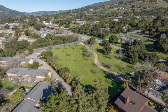 an aerial view of a city with lots of residential buildings