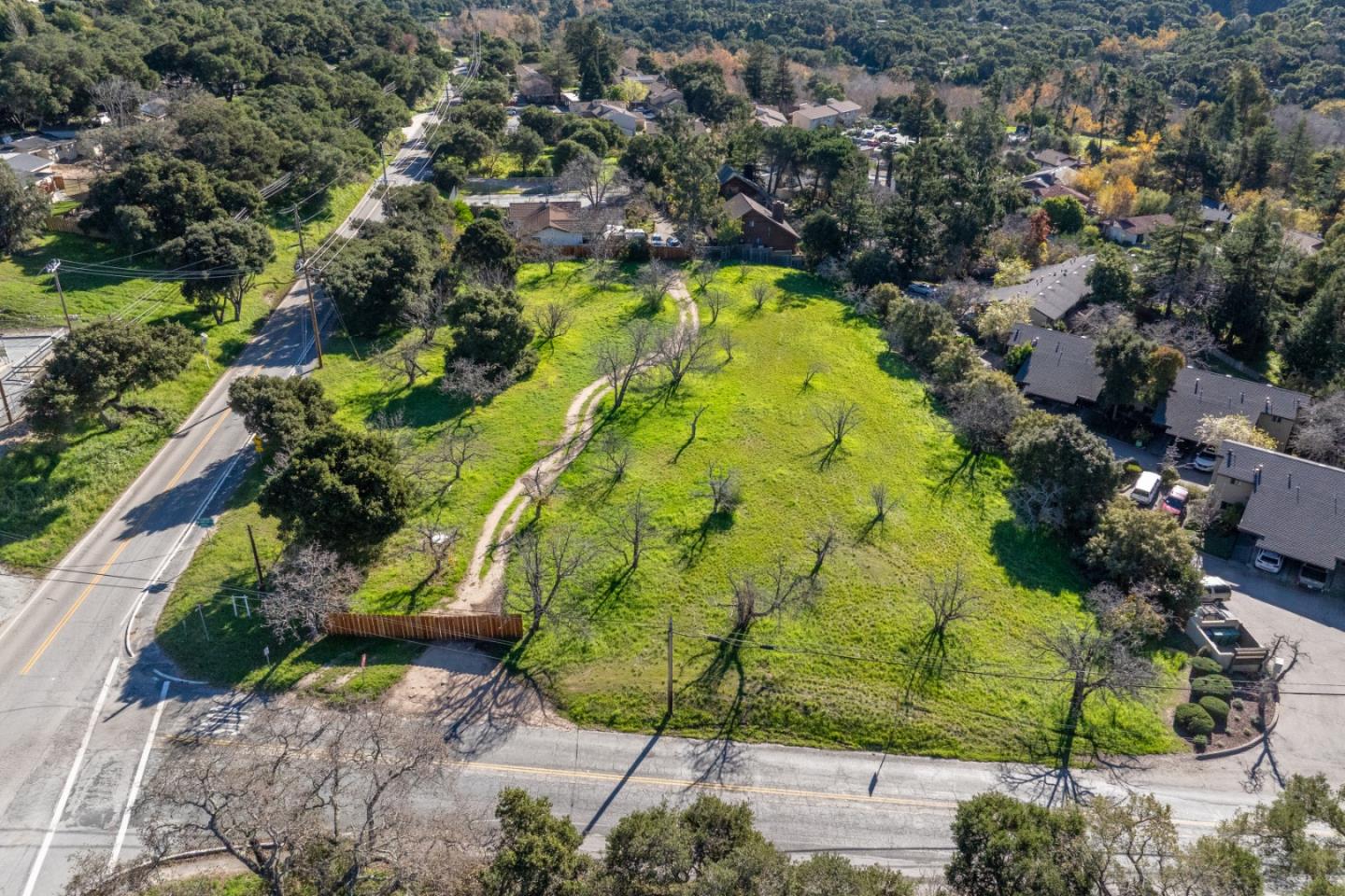 29 East Carmel Valley Road Carmel Valley, CA 93924 - Photo 10 of 15 an aerial view of residential houses with swimming pool