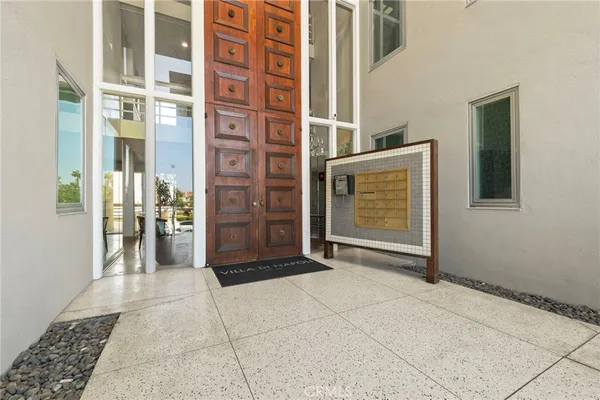 a view of livingroom with furniture and a chandelier