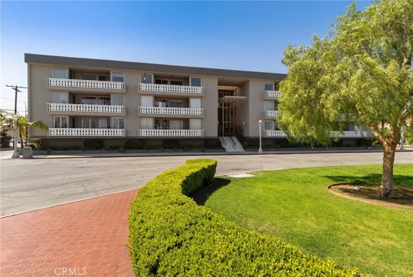 an aerial view of a house with a ocean view