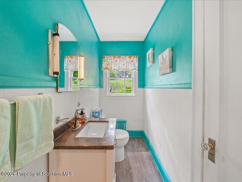 71 Pleasant Avenue Thompson, PA 18465 - Photo 15 of 37 a bathroom with a sink and a mirror