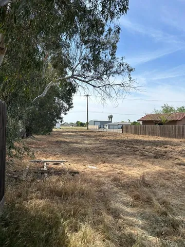 a view of ocean view with large trees