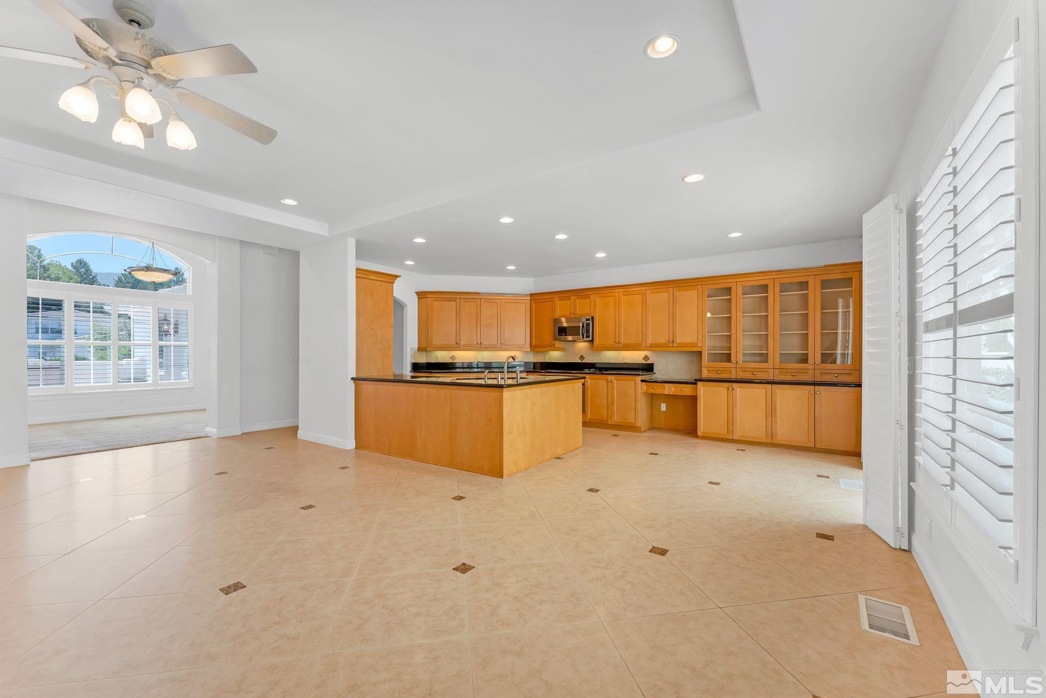 2681 Spearpoint Drive Reno, NV 89509 - Photo 11 of 36 a view of kitchen with furniture and refrigerator