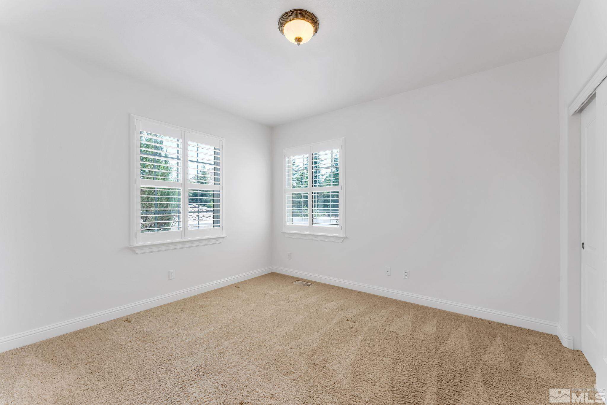 2681 Spearpoint Drive Reno, NV 89509 - Photo 25 of 36 an empty room with windows