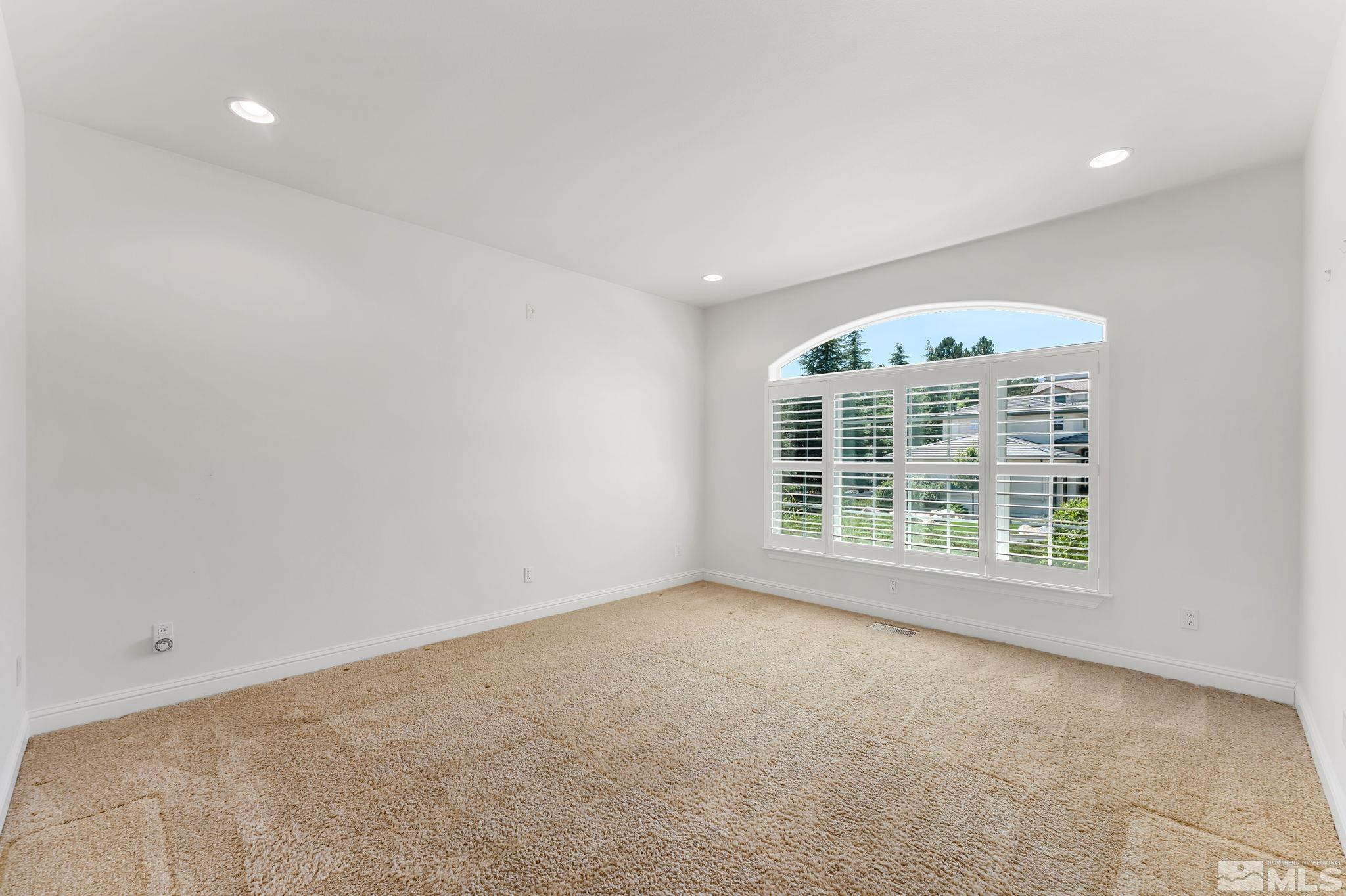 2681 Spearpoint Drive Reno, NV 89509 - Photo 28 of 36 an empty room with a window