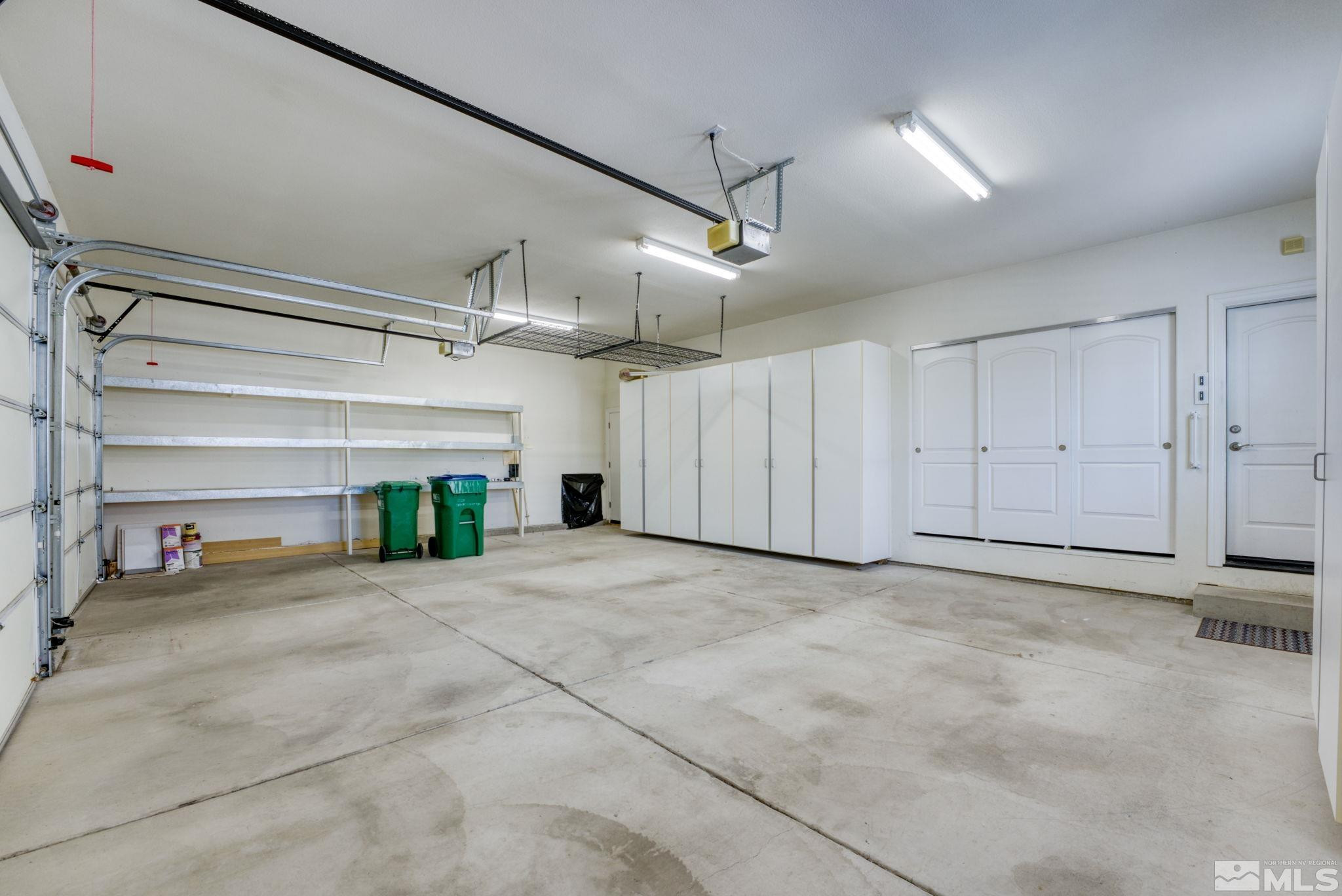 2681 Spearpoint Drive Reno, NV 89509 - Photo 30 of 36 a view of empty room with garage and window