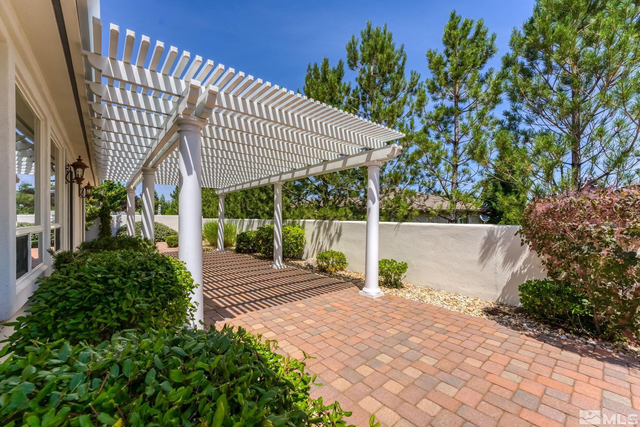 2681 Spearpoint Drive Reno, NV 89509 - Photo 35 of 36 a view of a backyard with a garden