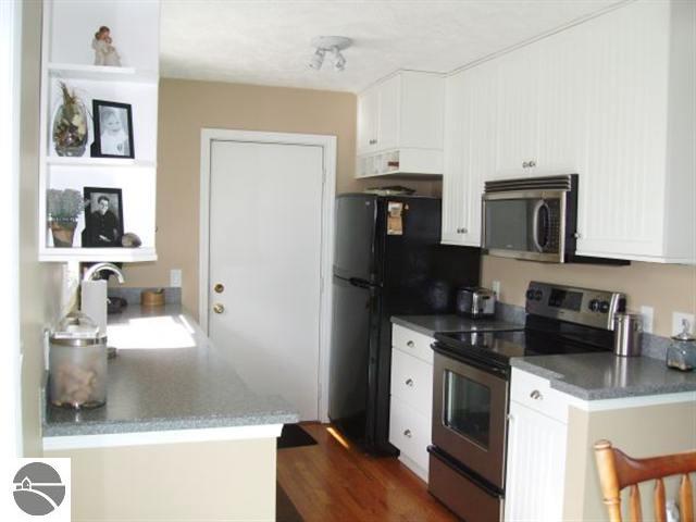 5743 Apple Valley Road Williamsburg, MI 49690 - Photo 2 of 15 1703395-1.JPG