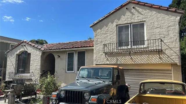 a view of a house with a balcony