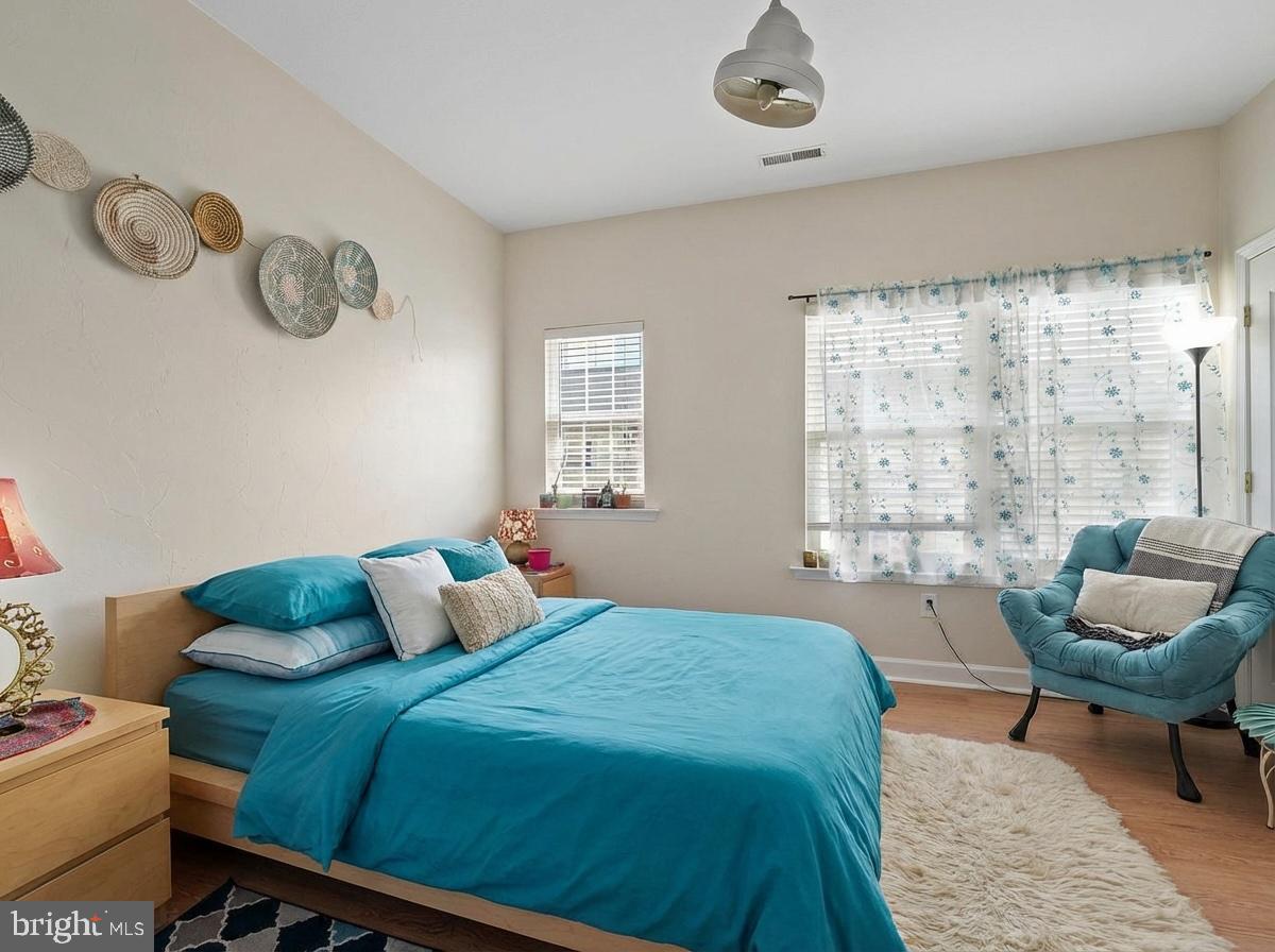 3261 Nile Lane Laurel, MD 20724 - Photo 13 of 21 a bedroom with a bed and chair