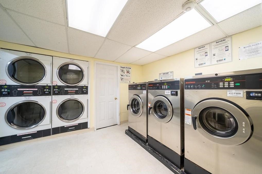 6701 Boulevard East, Unit E4 West New York, NJ 07093 - Photo 11 of 12 a utility room with dryer and washer