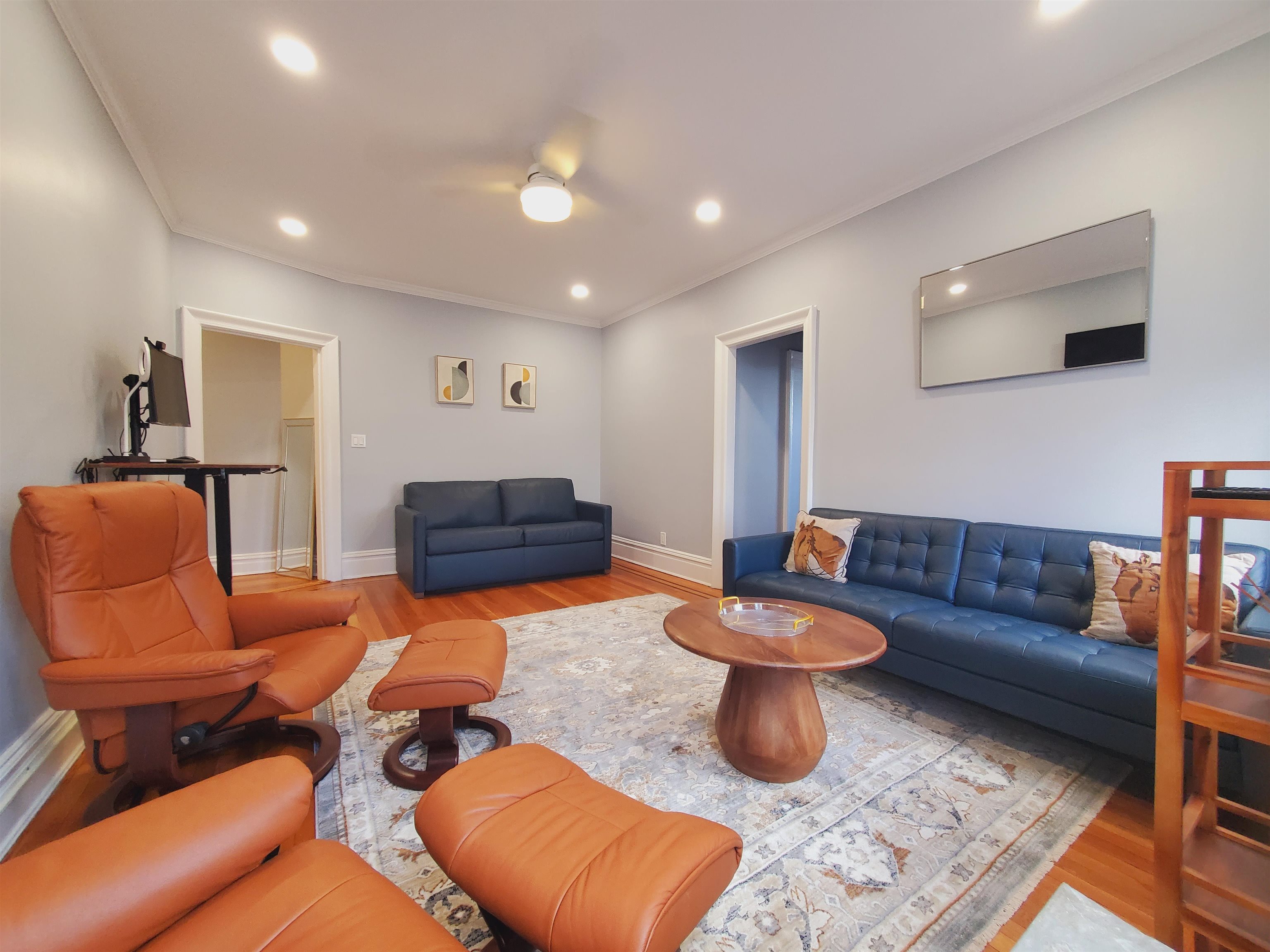 6701 Boulevard East, Unit E4 West New York, NJ 07093 - Photo 3 of 12 a living room with furniture a rug and a lamp