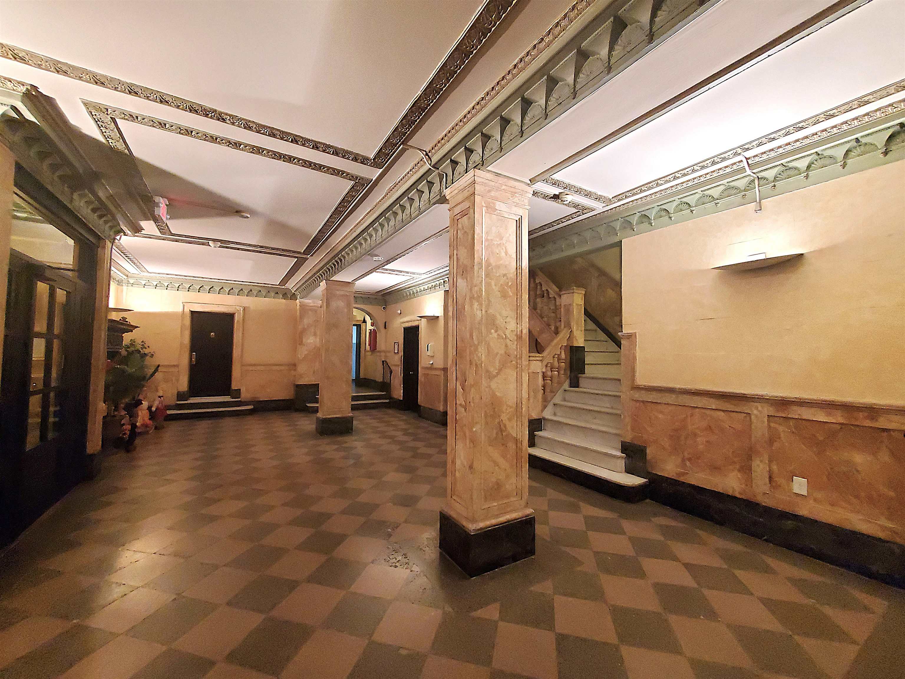 6701 Boulevard East, Unit E4 West New York, NJ 07093 - Photo 10 of 12 a view of a porch with wooden floor and furniture