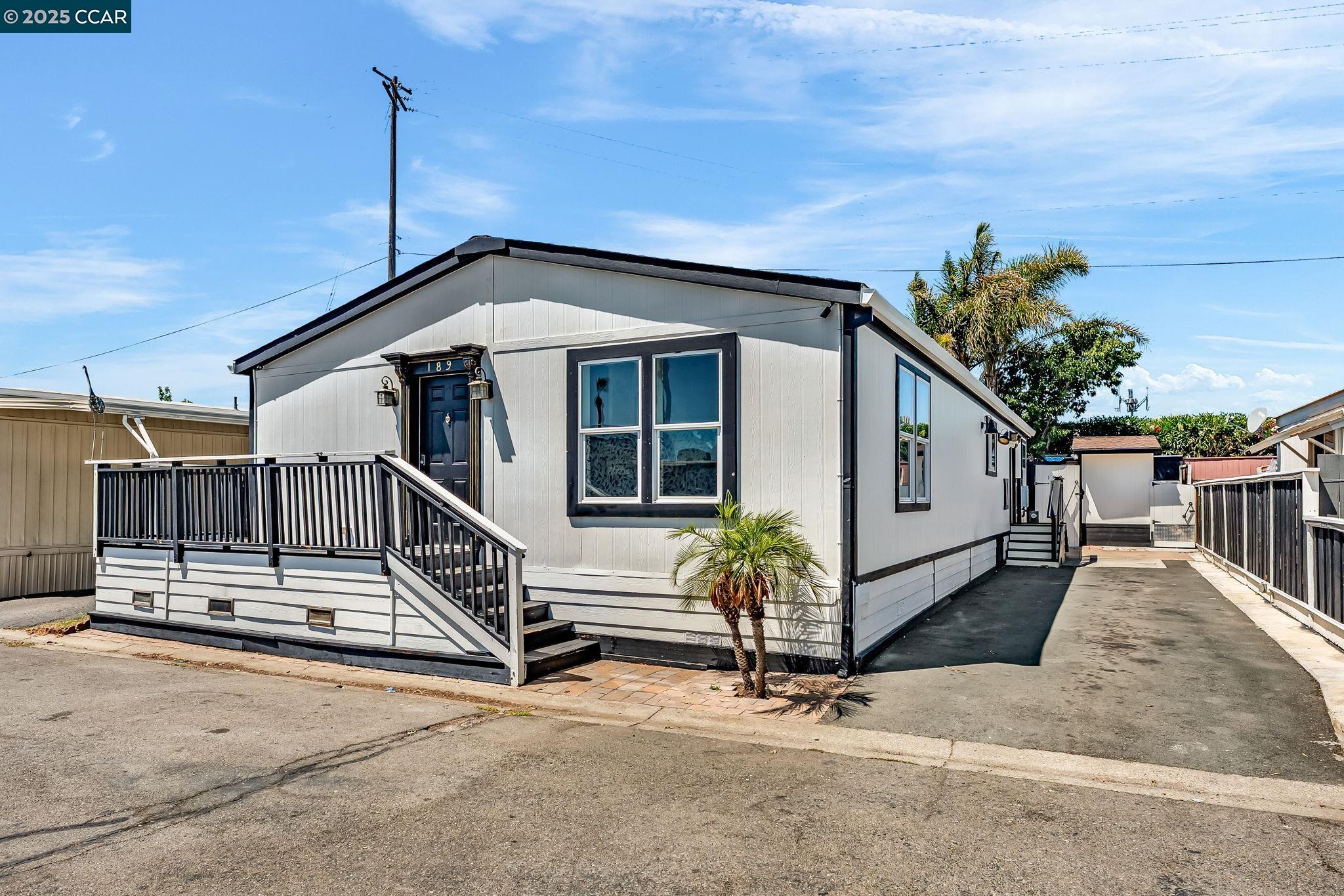 189 Suez Drive, Unit 72 Pacheco, CA 94553 - Photo 2 of 45 a front view of a house with garden