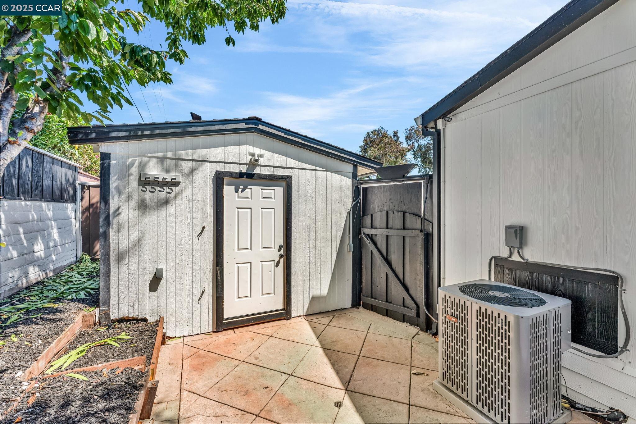 189 Suez Drive, Unit 72 Pacheco, CA 94553 - Photo 44 of 45 a front view of a house with a yard