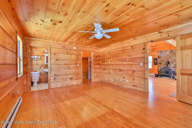 a view of swimming pool with seating space