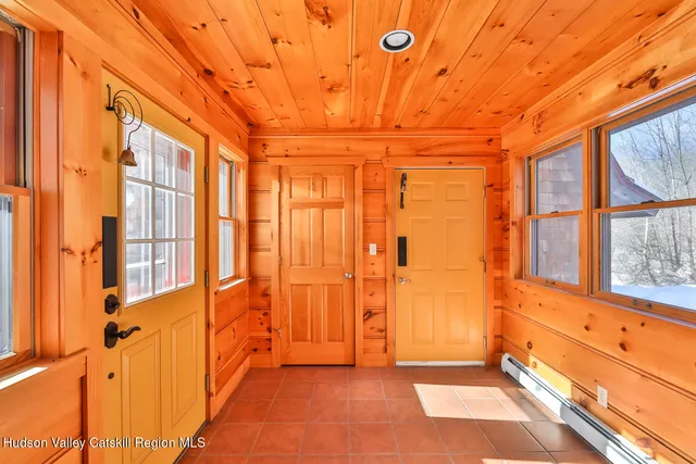 a view of walk in closet with empty room