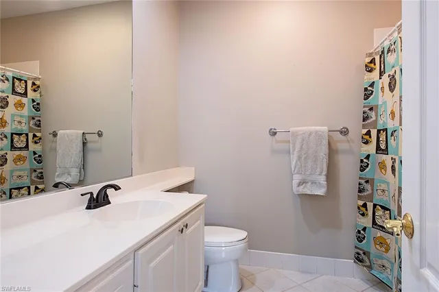 a view of bathroom with a sink toilet and shower