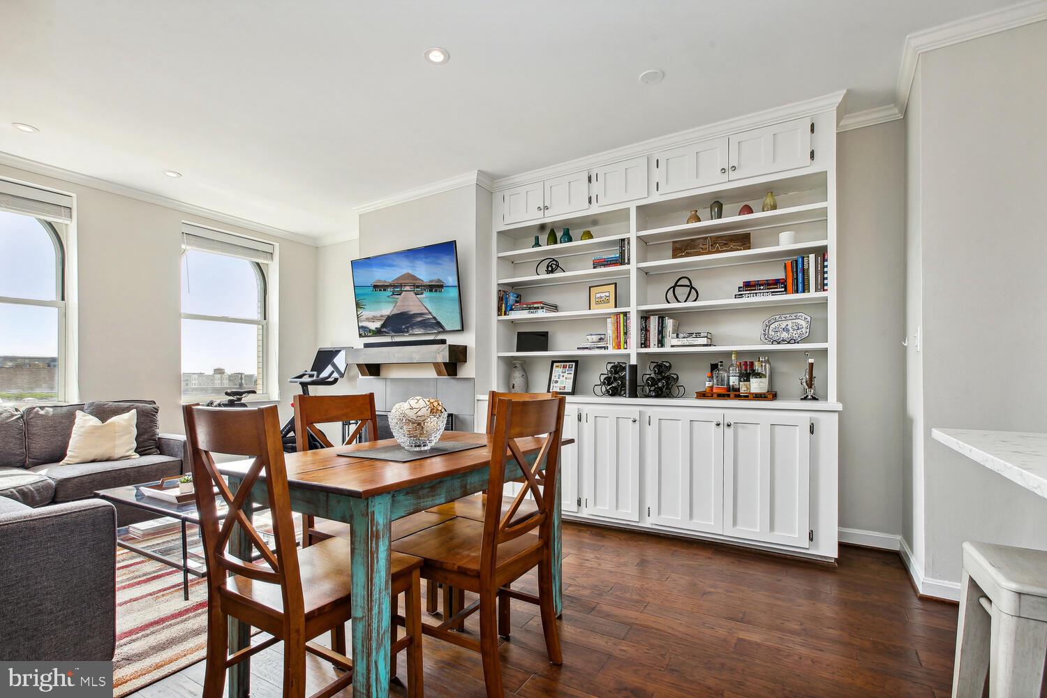 2000 16th Street Northwest, Unit 605 Washington, DC 20009 - Photo 6 of 16 a dining room with furniture and wooden floor