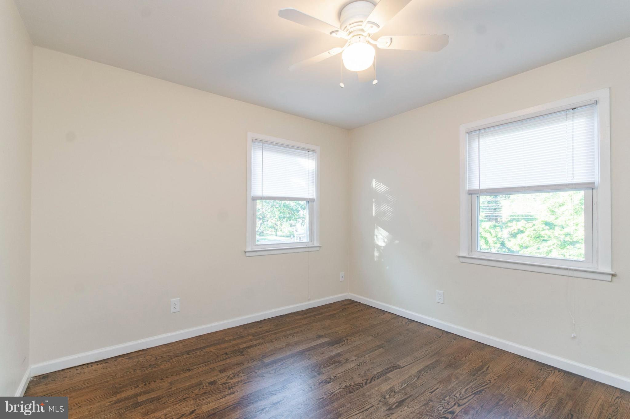 151 North Harrison Street Princeton, NJ 08540 - Photo 13 of 19 an empty room with wooden floor and windows
