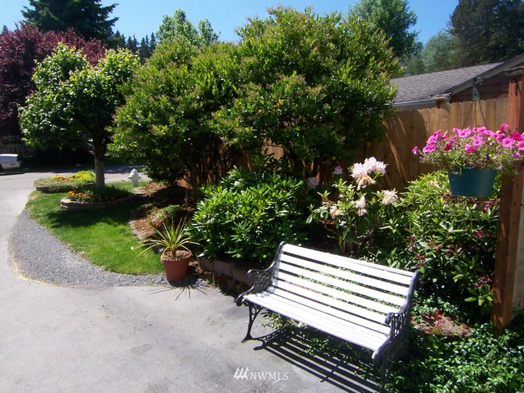 10624 Northeast 175th Street Bothell, WA 98011 - Photo 10 of 17 a view of a backyard with a garden