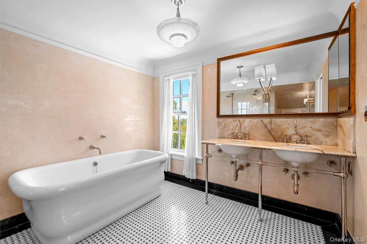 245 River Road Nyack, NY 10960 - Photo 29 of 45 Full bathroom featuring a freestanding tub and dual sinks