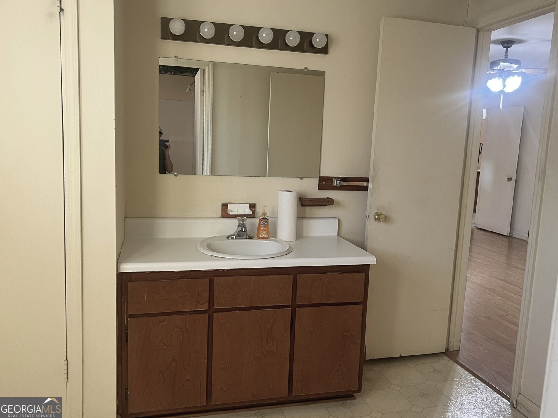 3640 South Walden Road Macon, GA 31216 - Photo 13 of 21 a bathroom with a sink and a mirror