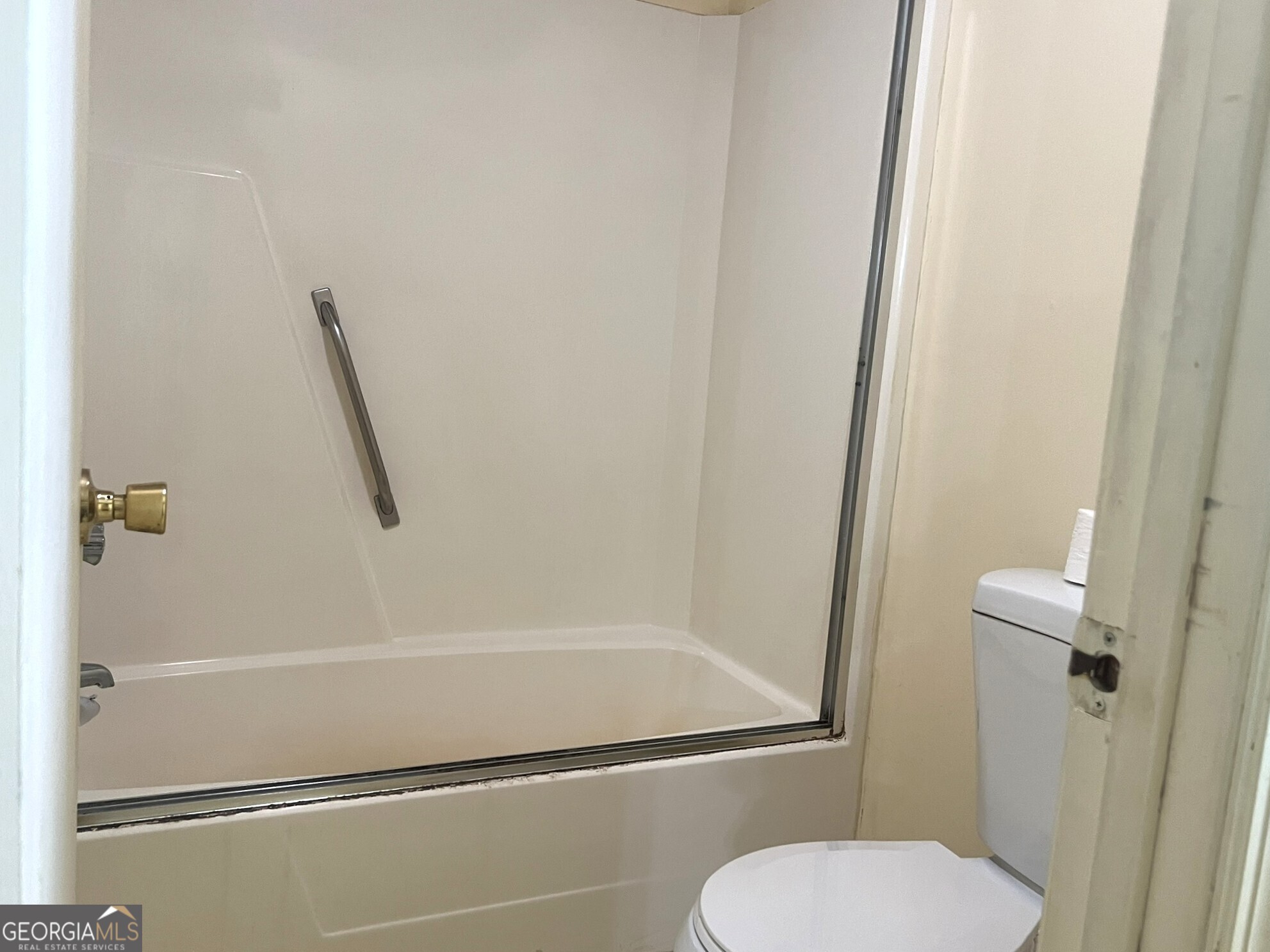 3640 South Walden Road Macon, GA 31216 - Photo 14 of 21 a bathroom with a toilet and a shower