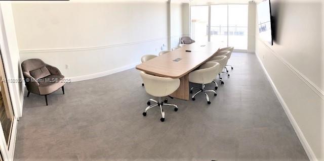 4100 Salzedo Street, Unit 702 Coral Gables, FL 33146 - Photo 7 of 15 a view of a workspace with furniture and a window