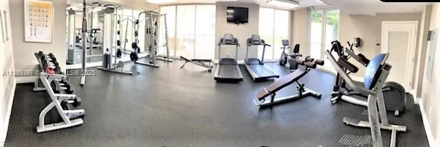 a kitchen with a stove top oven and sink