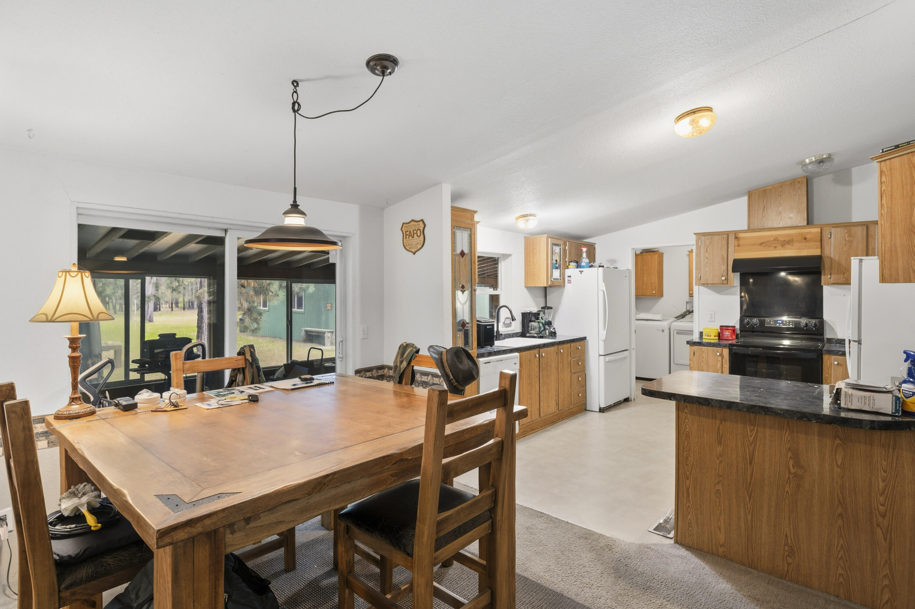 16928 Covina Road Bend, OR 97707 - Photo 11 of 48 a view of a dining room with furniture