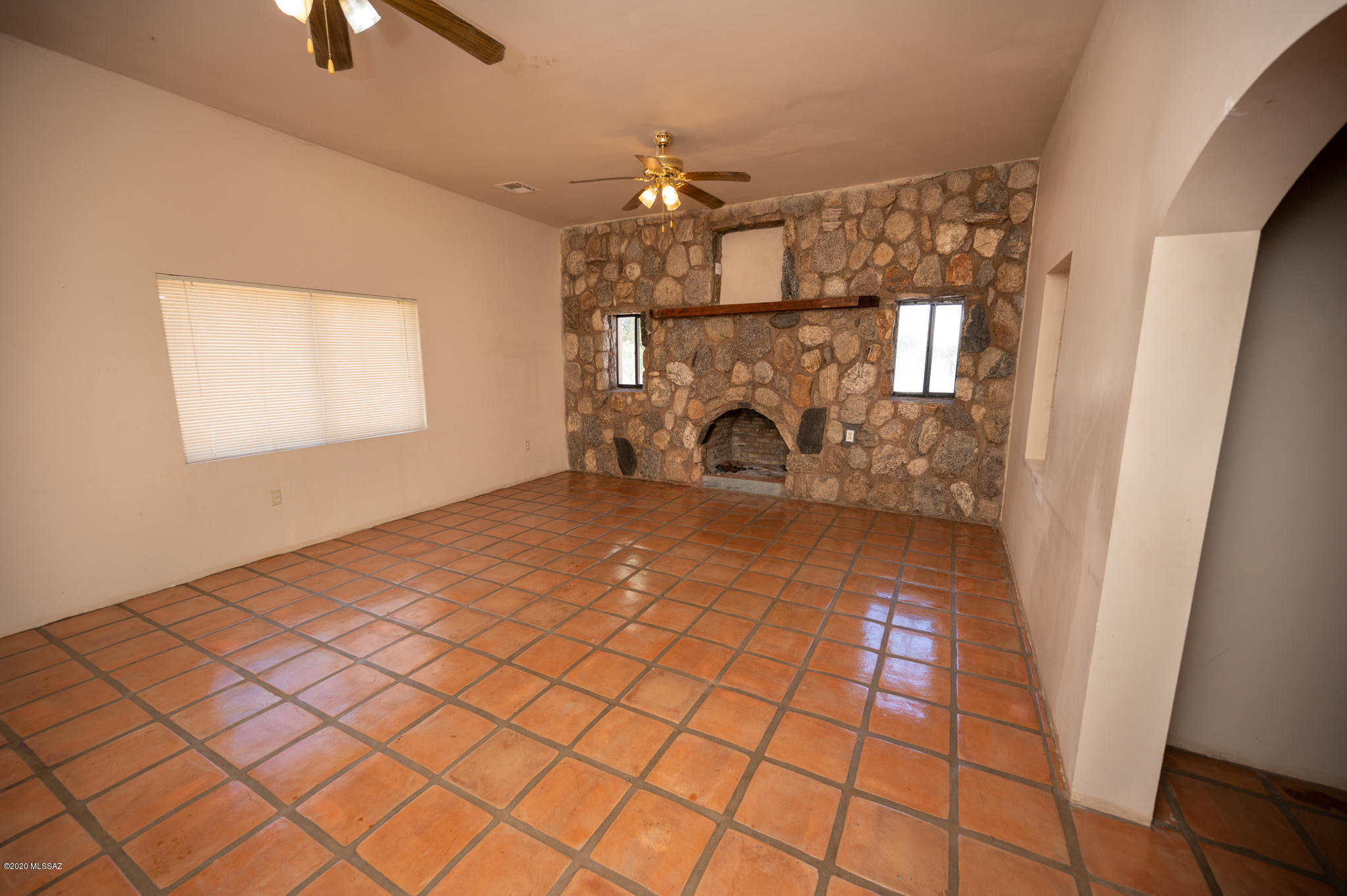 964 Calle Robalo Rio Rico, AZ 85648 - Photo 13 of 35 a view of empty room with wooden floor
