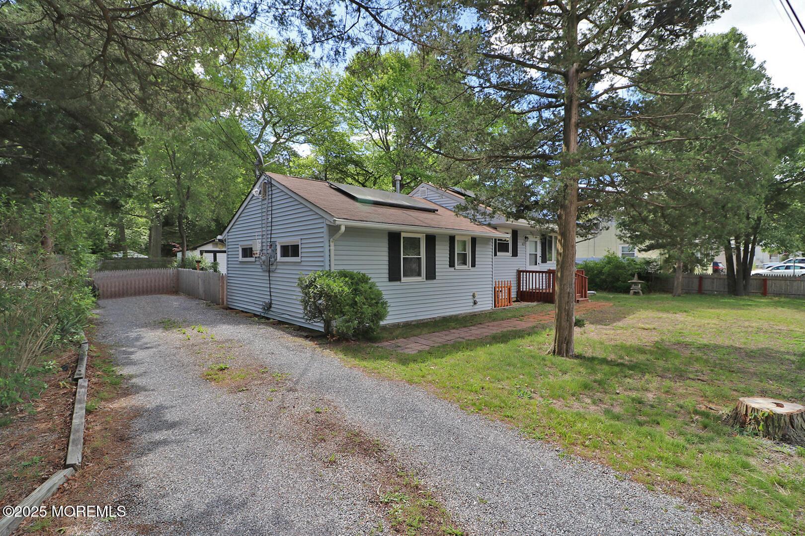 827 Rodgers Street Lanoka Harbor, NJ 08734 - Photo 4 of 33 a front view of house with yard and green space