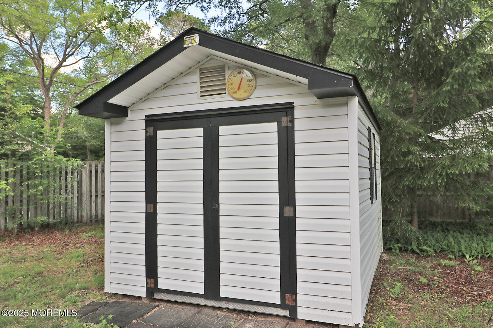 827 Rodgers Street Lanoka Harbor, NJ 08734 - Photo 6 of 33 a front view of a house with garden