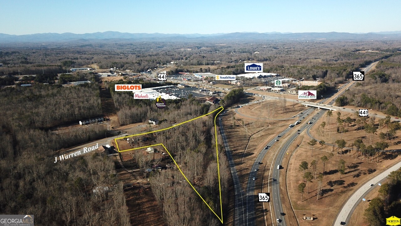 2778 J Warren Road Cornelia, GA 30531 - Photo 2 of 6 an aerial view of residential houses with city view