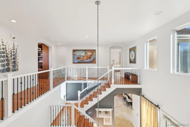a view of an entryway with wooden floor
