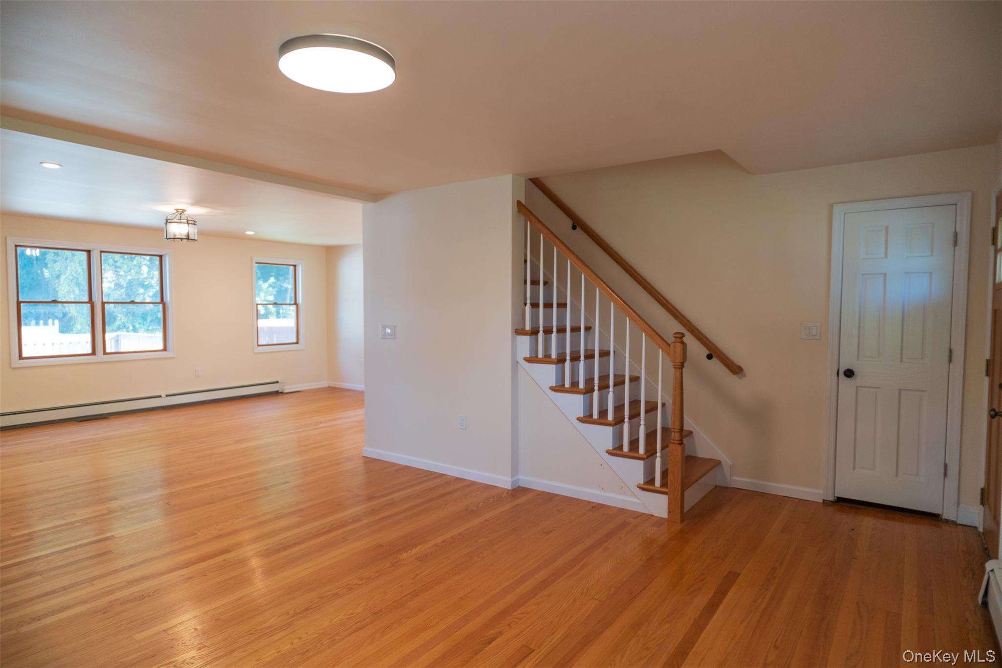 35 Rapalje Road Fishkill, NY 12524 - Photo 20 of 44 wooden floor in an empty room with a window and wooden floor